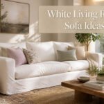 A white living room sofa with plush cushions and clean lines.